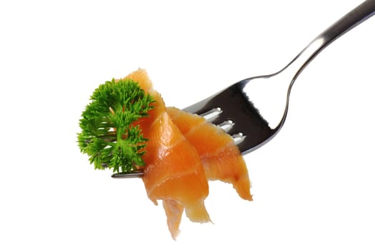 Smoked salmon with parsley on a fork