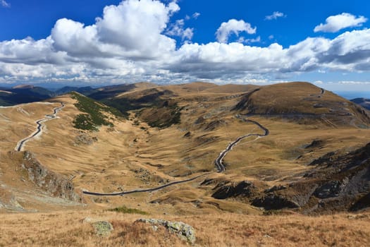 Landscape with Transalpina road and Urdele peak of Parang mountains in Romania