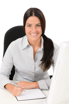 Successful business woman at office smiling sitting table write notepad