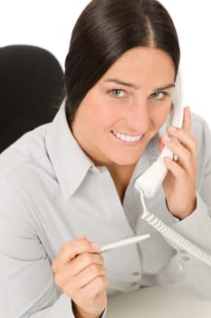 Smiling businesswoman attractive calling on phone close-up portrait