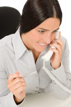 Smiling businesswoman attractive calling on phone close-up portrait