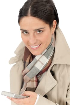 Autumn fashion pretty business woman portrait with phone typing