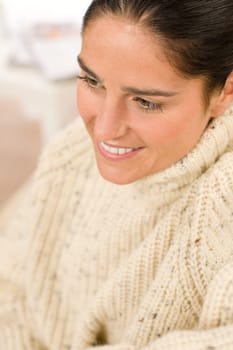 Winter portrait of happy woman wear pullover smiling posing