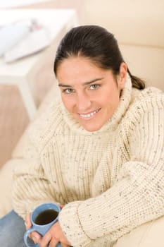 Winter portrait happy woman with coffee cup wear pullover