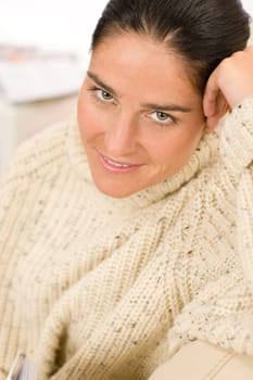Winter portrait of happy woman wear pullover smiling posing