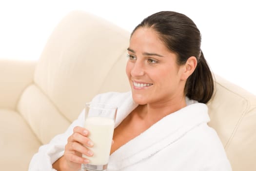 Attractive mid-aged woman drink glass of milk for breakfast portrait