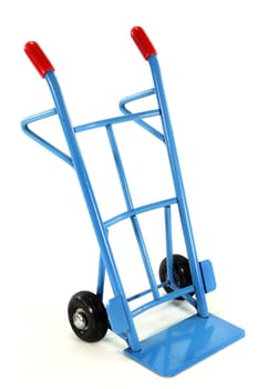 a sack truck loaded with jute sacks
