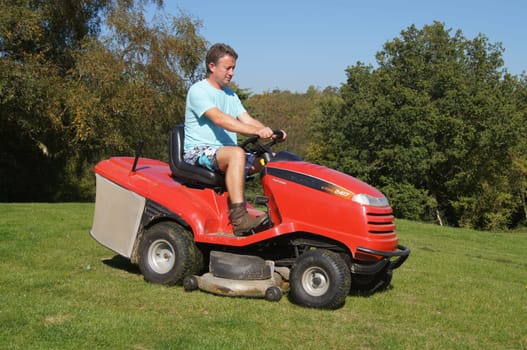 Man Cutting his Lawn
