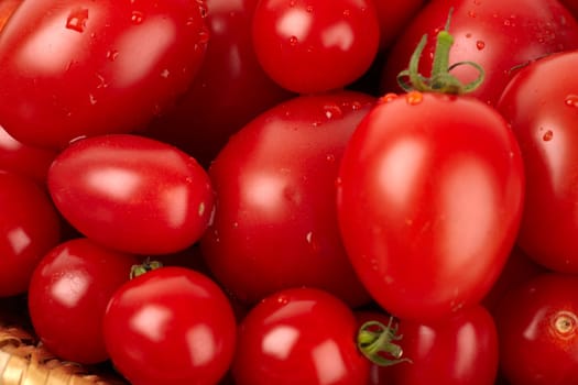 Red tomatoes with water drops in close-up