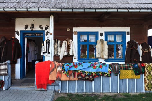 a house decorated with traditional folk clothes