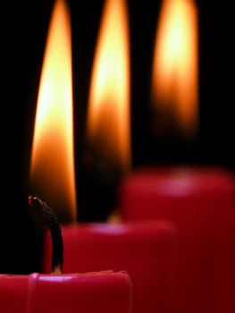 three burning candles
