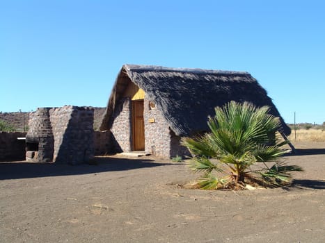 House in a dry land. Desert life. African stile in architecture