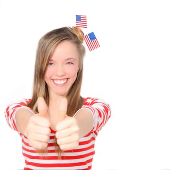 beautiful American young woman celebrating 4th of july with flag