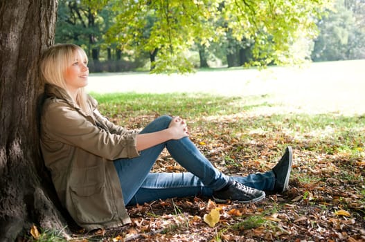 Young woman sitting in the park