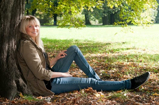 Young woman sitting in the park