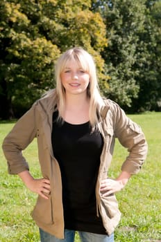 Young woman standing on a meadow
