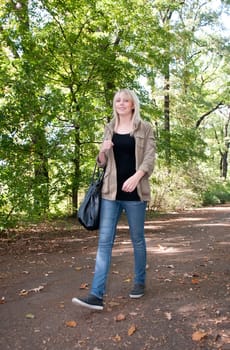 Young woman walking in the park