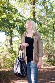 Young woman walking in the park