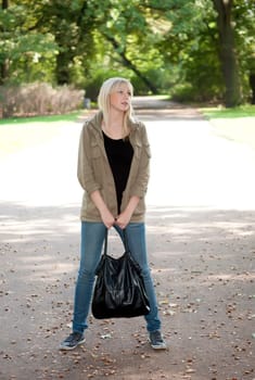 Young woman standing in the park