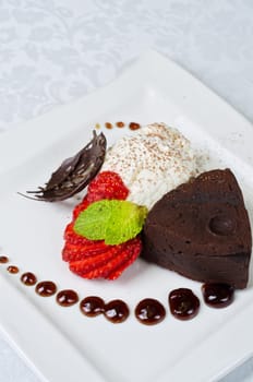 Chocolate flan with strawberries and chocolate, a wonderful dessert