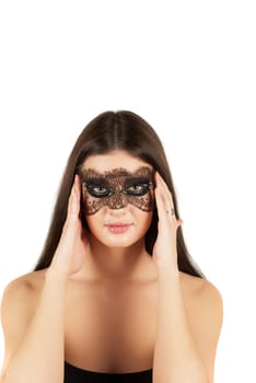 girl at mask closeup on a white background