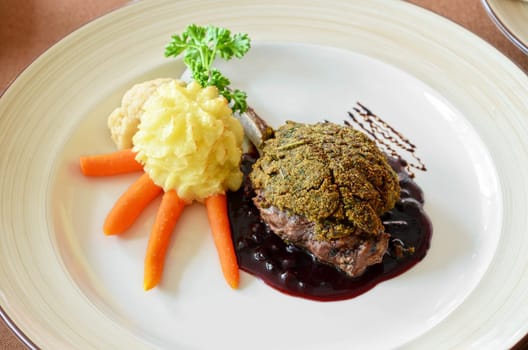 venison with whortleberry sause, herb and vegetales