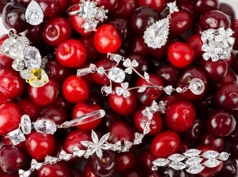 Jewels at fruit red ripe cherries berry background