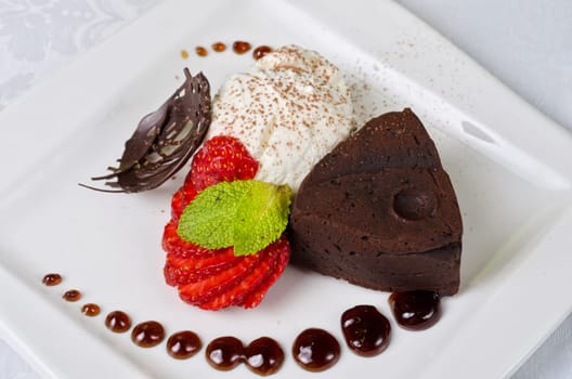 Chocolate flan with strawberries and chocolate, a wonderful dessert