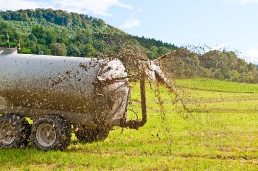 Tractor drives slurry