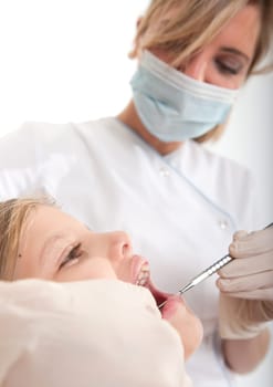 Dentist treating a child