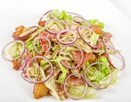 Onion salad of meat with roast vegetables
