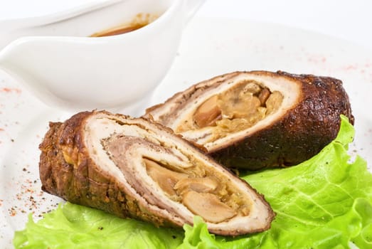 Meat wrapped with beef and pork and chicken breast, thyme, rosemary