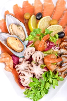 appetizer closeup of different seafood and vegetables