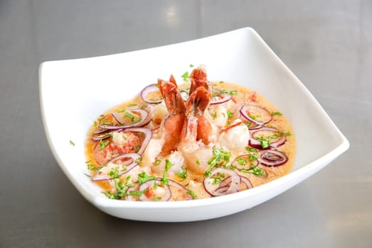 King shrimps with vegetables at cream sauce