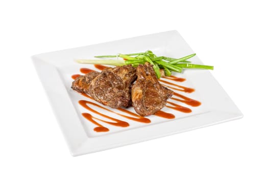 Roasted lamb meat tied with scallion on a white