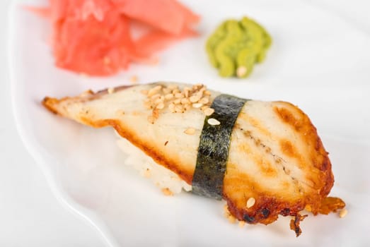unagi sushi of eel with ginger, seaweed and sesame