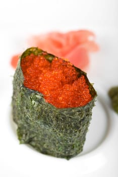 Red tobiko (flying fish roe) sushi closeup