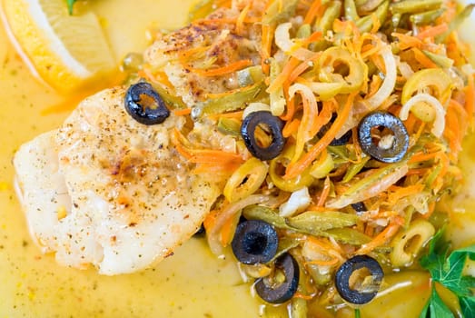 Tasty fish pike perch with mix of vegetables