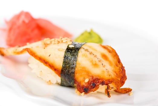 unagi sushi of eel with ginger, seaweed and sesame