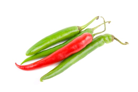 Color chilli peppers isolated on a white