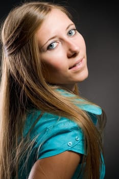 Portrait of a sexy woman with beautiful brown long hair