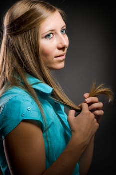 Portrait of a sexy woman with beautiful brown long hair