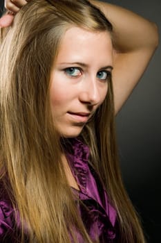 Portrait of a sexy woman with beautiful brown long hair