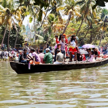 North Paravoor, Gothuruth, Kerala, India, Asia - September 25th: Gothuruth Boat Race close up of the fancy dress men in drag boat crop marging copy empty space