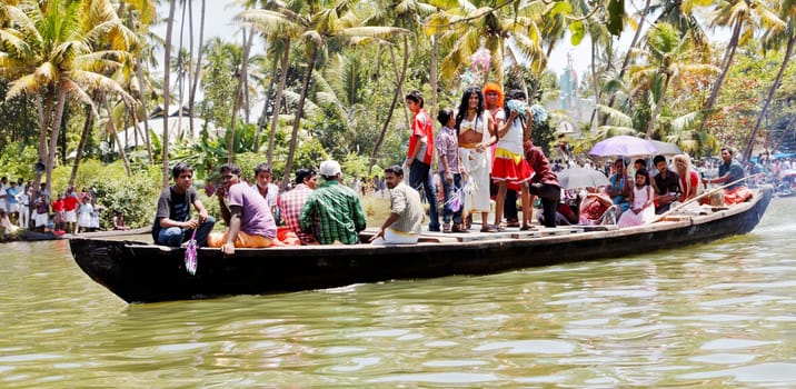 North Paravoor, Gothuruth, Kerala, India, Asia - September 25th: Gothuruth Boat Race close up of the fancy dress men in drag boat crop marging copy empty space