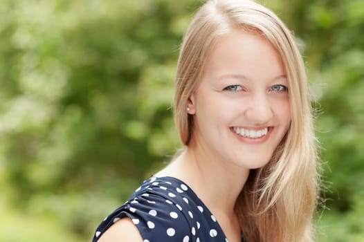 Portrait of a young and smiling woman