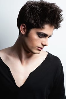 Fashion shot of a young man in the studio