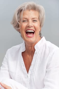 Active senior woman on the beach
