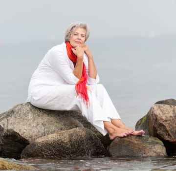 Active senior woman on the beach