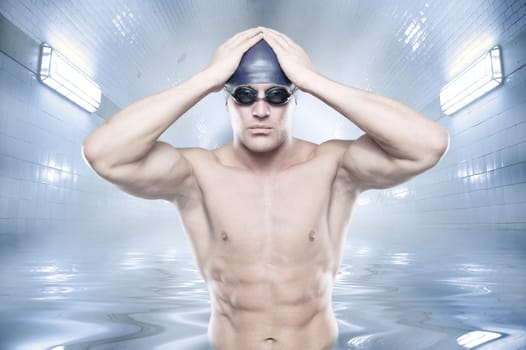 Sporty swimmer standing in a tunnel in the water